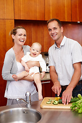 Image showing Portrait, family and people in kitchen for love, happiness and bonding at home, house and apartment together. Man, woman and baby with vegetables for salad, nutrition and wellness with smile or laugh