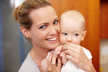 Image showing Portrait, mother and child with love, happy and bonding for childhood development in house, home and apartment. Woman, baby eating and family with smile for affection, growth for kid and together