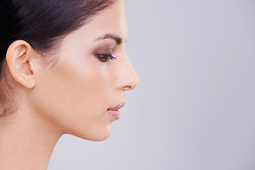 Image showing Woman, face and profile with beauty and skin, dermatology and mockup space with cosmetics on white background. Makeup, transformation and healthy glow for wellness, skincare and self care in studio