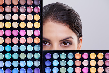 Image showing Beauty, makeup palette and portrait of woman in studio for cosmetics, powder and foundation on gray background. Closeup, skincare and model with cosmetology product, facial glow and eyeshadow