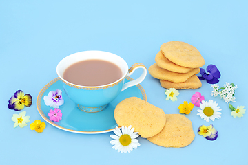 Image showing English Afternoon Tea with Cookies Teacup and Flowers 