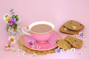 Image showing Afternoon Tea For One with Cookies and Flowers 