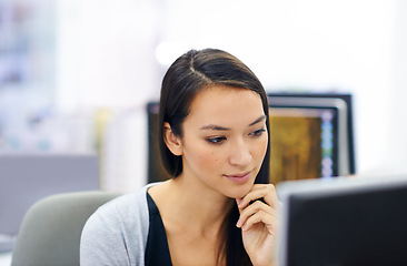 Image showing Professional woman, thinking and computer at desk in office workplace for website design and content creation. Asian female person, sitting and at laptop for research proposal tasks on internet.