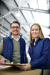 Image showing Warehouse, portrait and people with clipboard for parcel, inventory and boxes for shipping. Colleagues, documents and collaboration on import or export, factory and papers for logistics on delivery