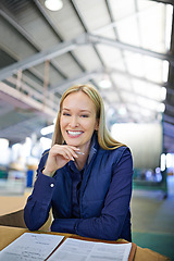 Image showing Portrait, supervisor and happy as businesswoman in logistics at factory with machines for supply chain. Woman, warehouse and table with paperwork in manufacturing and distribution business with smile