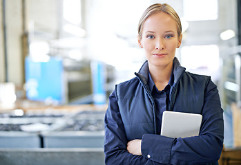 Image showing Warehouse, machine and portrait of woman with tablet for manufacturing, supply chain and production. Female person, confidence and arms crossed with technology for inventory, storage or ecommerce