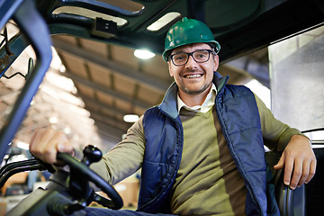 Image showing Man, portrait and forklift in warehouse driving for supply chain factory or logistics, import or delivery. Male person, face and hardhat for supplier manufacturing or courier, storage or distribution