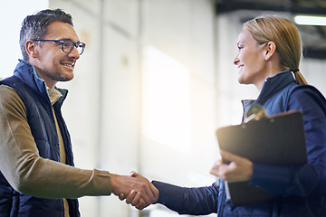 Image showing Business people, handshake and welcome for b2b collaboration, partnership and agreement. Professional, clipboard and shaking hands for introduction, b2b onboarding or teamwork in shipping warehouse