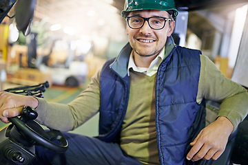 Image showing Man, portrait and forklift in warehouse for transport or distribution supply chain, import or delivery. Male person, face and hardhat for supplier in factory or manufacturing, courier or workshop