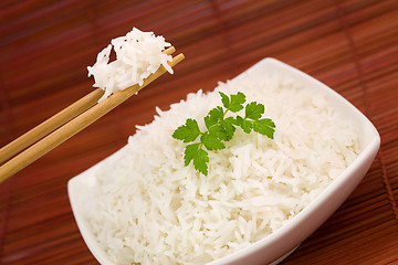 Image showing Bowl of rice on mat