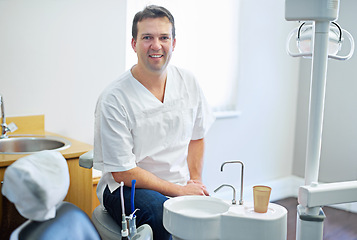 Image showing Man, portrait and dentist for teeth health or wellness at basin for cleaning hygiene, whitening or equipment. Male person, face and employee for mouth insurance or gum clinic, smiling or dental care