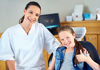 Image showing Thumbs up, clinic and portrait of dentist with child for cleaning, teeth whitening and wellness. Healthcare, dentistry and happy woman and girl for dental hygiene, oral care and medical services