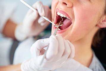 Image showing Girl, kid and mouth inspection at dentist with healthcare tool, consultation or dental mirror for oral health. Professional, child patient or glove hand for teeth cleaning, gingivitis or medical care