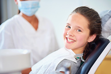 Image showing Dental, smile or portrait of girl with dentist in consultation room for mouth, gum or wellness. Cleaning, teeth whitening or kid consulting orthodontist for tooth, growth or braces and development