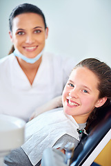 Image showing Consulting, dentist and portrait of child in chair for cleaning, teeth whitening and wellness. Healthcare, dentistry and woman and girl with tools for dental hygiene, oral care and medical services