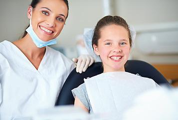 Image showing Portrait of dentist and child for consulting, dental service and teeth whitening for wellness in clinic. Healthcare, dentistry and happy woman and girl hygiene, oral care and medical consultation