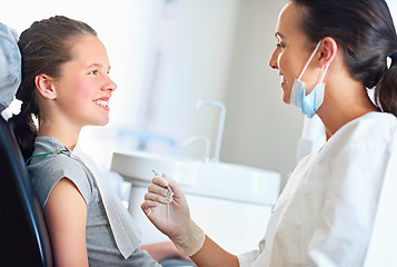 Image showing Woman, child and dentist chair with happy people, oral surgery for examination for hygiene and health. Teeth, orthodontist and working in medical practice, dental wellbeing or consulting for cleaning