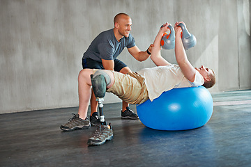 Image showing Amputee, physiotherapist and help with kettlebells or exercise ball at gym for recovery, strength and healthcare rehabilitation. Physiotherapy, coach and support or consultation or workout for man