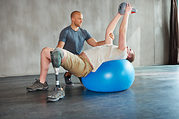 Image showing Patient with disability, physiotherapist and help with kettlebell for stretching at gym for recovery, strength and healthcare rehabilitation. Physiotherapy, coach and client for support with exercise