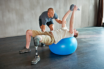 Image showing Patient with disability, physiotherapist and help with kettlebell for exercise at gym for recovery, strength and healthcare rehabilitation. Physiotherapy, amputee or man for consultation with ball