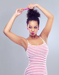 Image showing Comb, haircare and thinking female person, beauty and brunette in studio isolated on white background. Confidence, arms and hairstyle for curly African woman model, brush and self care for cosmetic