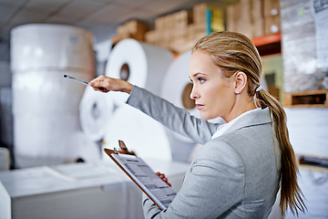 Image showing Warehouse, manager and woman with clipboard, business and working as employee in corporate company. Storage, staff and female person with checklist, inventory and logistics for packaging in store