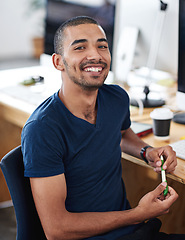 Image showing Web designer, employee and portrait of confident man at desk in coworking office for creating, plans and schedules. Young professional, computers and technology for online web development career.