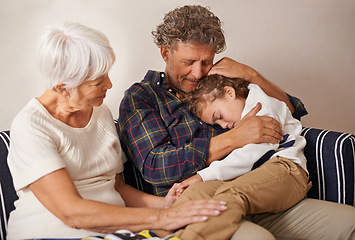 Image showing Grandparents, child and home on sofa for comfort, family support with love for kid. Sleep, children development and elderly people together or hug in living room, calm and peace with senior couple