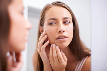 Image showing Face, beauty and pimple with woman in bathroom of home for skincare, cosmetics or hygiene. Aesthetic, wellness and skin inspection with confident young person in apartment closeup for dermatology