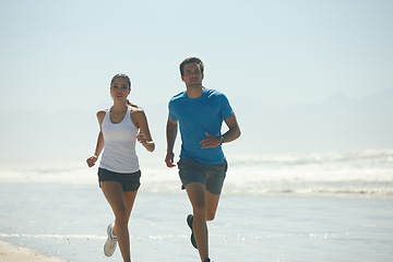 Image showing Cardio, beach and running with couple, training and summer with wellness and workout with morning routine. Seaside, energy or man with woman or runner with fitness and ocean with exercise or hobby