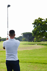 Image showing Man, golfer and back with club on golf course for game, match or outdoor sport on green grass or field in nature. Rear view of male person or player on lawn for hole, competition or fairway on mockup