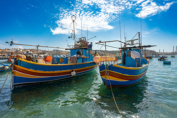 Image showing Traditional eyed colorful boats Maltese Luzzu, Marsaxlokk, Malta