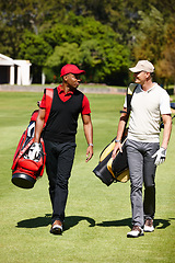 Image showing Walking, course and people outdoor for golf, game and training together at club in summer. Golfer, friends and men on grass turf in park with happiness from practice of sport in healthy competition