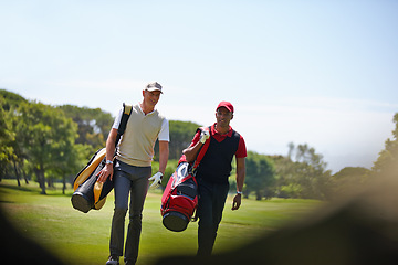 Image showing Walking, course and people outdoor for golf, game and training together at club in summer. Golfer, friends and men on grass turf in park with happiness from practice of sport in healthy competition