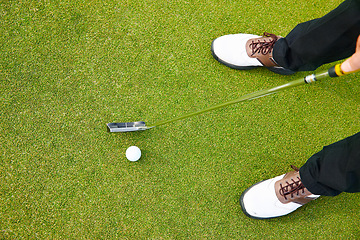 Image showing Feet, club and golf ball for practice on field, training and driver for competition or tournament. Closeup, top view and grass for outdoor challenge and exercise, person and athlete for contest