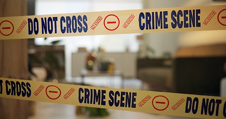 Image showing Crime scene, tape and evidence in house for case, inspection and investigation in living room. Apartment, home and lounge with warning from police, forensic and analysis of in flat for justice