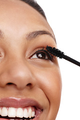 Image showing Closeup, mascara for lashes and woman with beauty, brush for makeup and eye on white background. Cosmetology, cosmetics product and wand for eyelash, face zoom and volume with makeover in studio