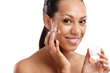 Image showing Woman, portrait and beauty with lotion in studio with confidence for product, cream and facial. Female person, dermatology and wellness for healthy skin with skincare or self care and cosmetics