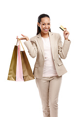 Image showing Woman, shopping bag and professional credit card in portrait, business purchase and payment with sale on white background. Finance, company expense and retail store discount with customer in studio