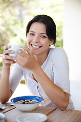 Image showing Woman, portrait and morning tea in outdoors, breakfast and relax on weekend trip in nature. Happy female person, drinking coffee and peace or calm on porch, smile and travel on vacation or holiday