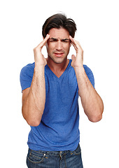 Image showing Stressed, man and suffering from headache in studio from overwork, burnout and mental health issues. Frustrated, person and standing with migraine problems in isolated white background