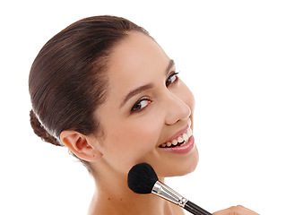 Image showing Woman, portrait and brush for powder in studio, makeup and foundation on white background. Female person, smile and apply cosmetics for beauty, makeover and transformation or tool for treatment