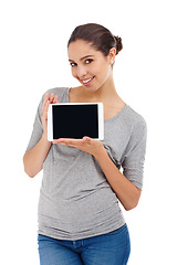 Image showing Portrait, smile and woman with tablet, promotion and connection isolated on a white studio background. Face, happy person or model with technology and internet with girl and showing with mockup space