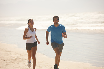 Image showing Cardio, beach and running with couple, fitness and summer with wellness and practice with morning routine. Seaside, energy or man with woman or runner with training and ocean with exercise or workout