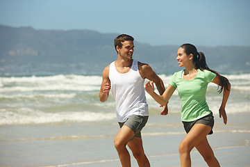 Image showing Training, beach and running with couple, fitness and summer with wellness or practice with morning routine. Seaside, energy or man with woman or runner with hobby or activity with exercise or workout