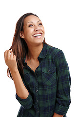 Image showing Woman, looking away and hair with smile, fashion and shirt in white background or studio. Female person, haircare and happy for clothing, apparel and outfit in backdrop, cheerful and edgy for style