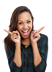 Image showing Woman, portrait and gesture with smile, fashion and shirt in white background or studio. Female person, expression and happy for clothing, apparel and outfit in backdrop, cheerful and edgy for style