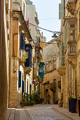 Image showing One of the small historic hidden streets in ancient city Vittoriosa - Birgu. Malta