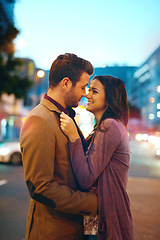 Image showing Couple, night and city with hug for love, bonding and romance in relationship with life partner. Happiness, affection and people with commitment and trust, sweet moment and romantic together outdoor