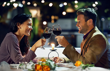 Image showing Smile, couple and cheers with wine at restaurant for date, love or holding hands together. Happy man, woman and toast with drink in glass for celebration, anniversary or romance with bokeh at night